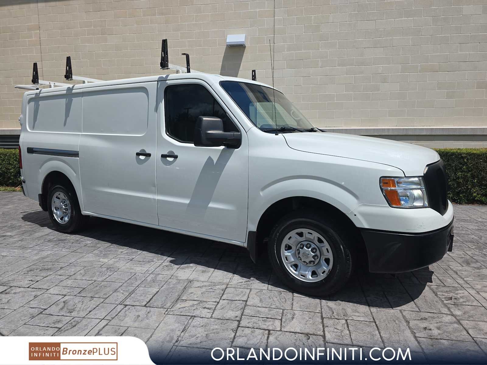 2021 Nissan NV1500 SV in Glacier White — front three-quarter view