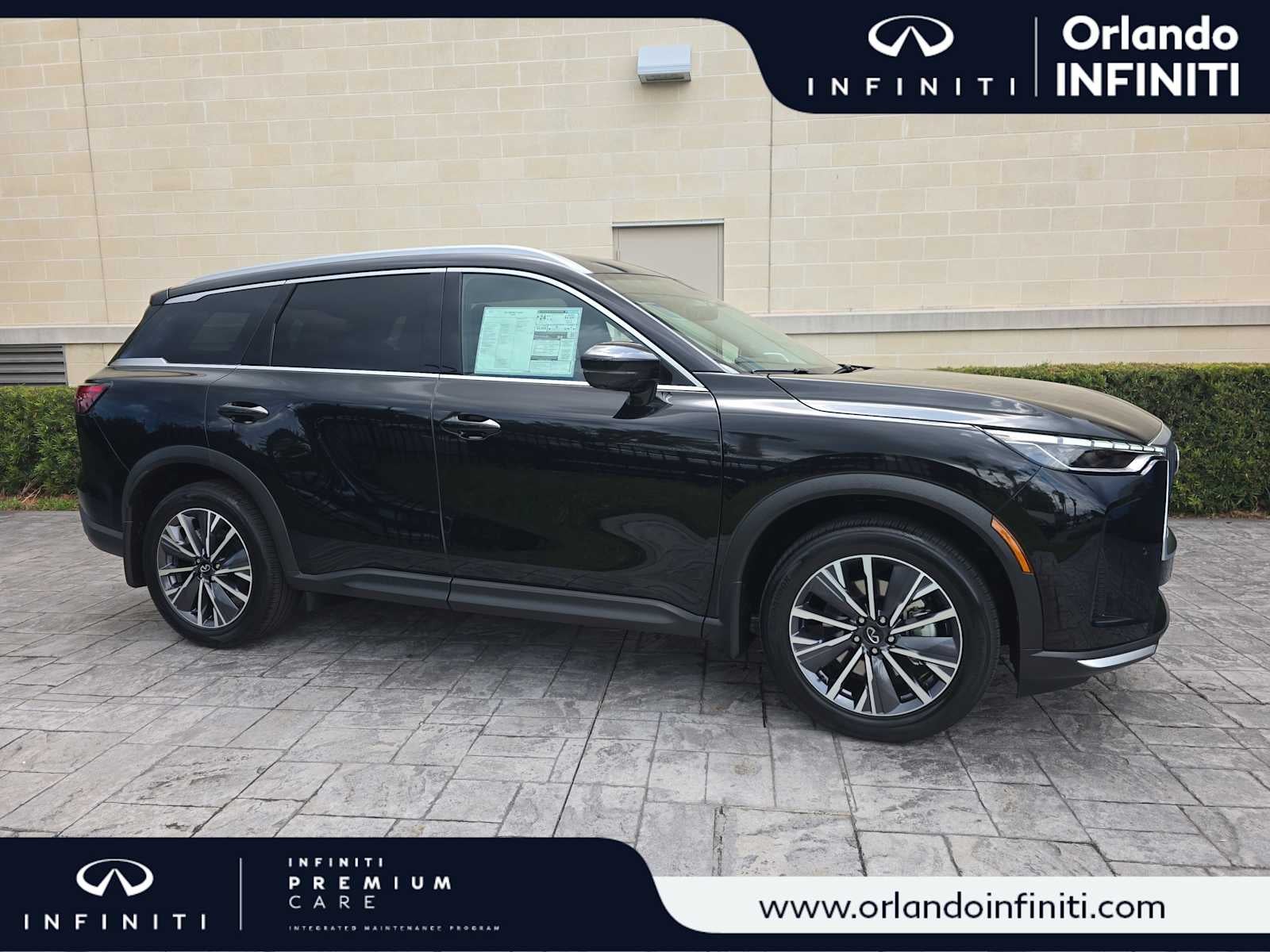 2027 INFINITI QX60 LUXE in Mineral Black — front three-quarter view