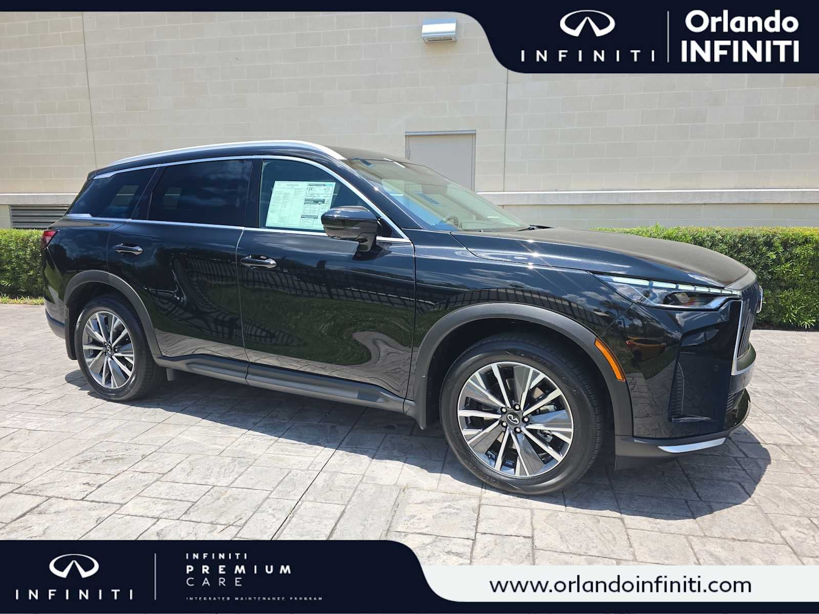 2027 INFINITI QX60 LUXE in Mineral Black — front three-quarter view