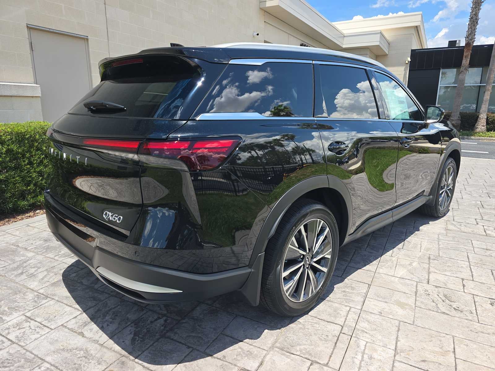 2027 INFINITI QX60 — rear three-quarter view