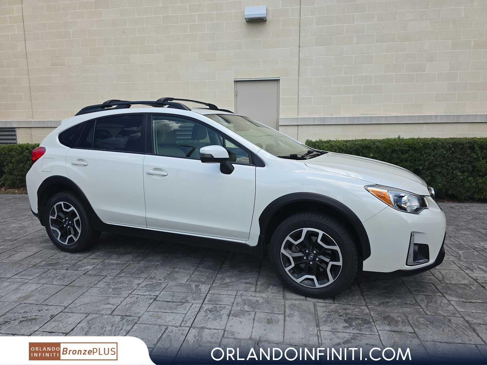2016 Subaru Crosstrek Limited in Crystal White Pearl — front three-quarter view