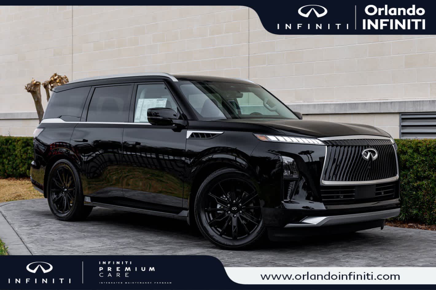 2026 INFINITI QX80 LUXE in Black Obsidian — front three-quarter view