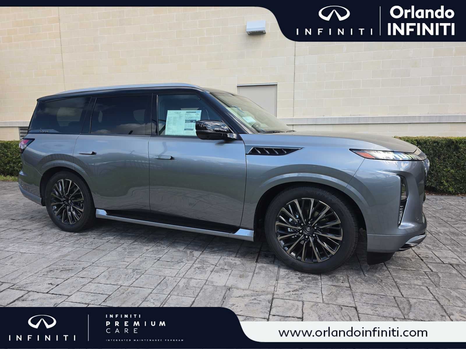 2027 INFINITI QX80 AUTOGRAPH in Dynamic Metal/Black Obsidian — front three-quarter view