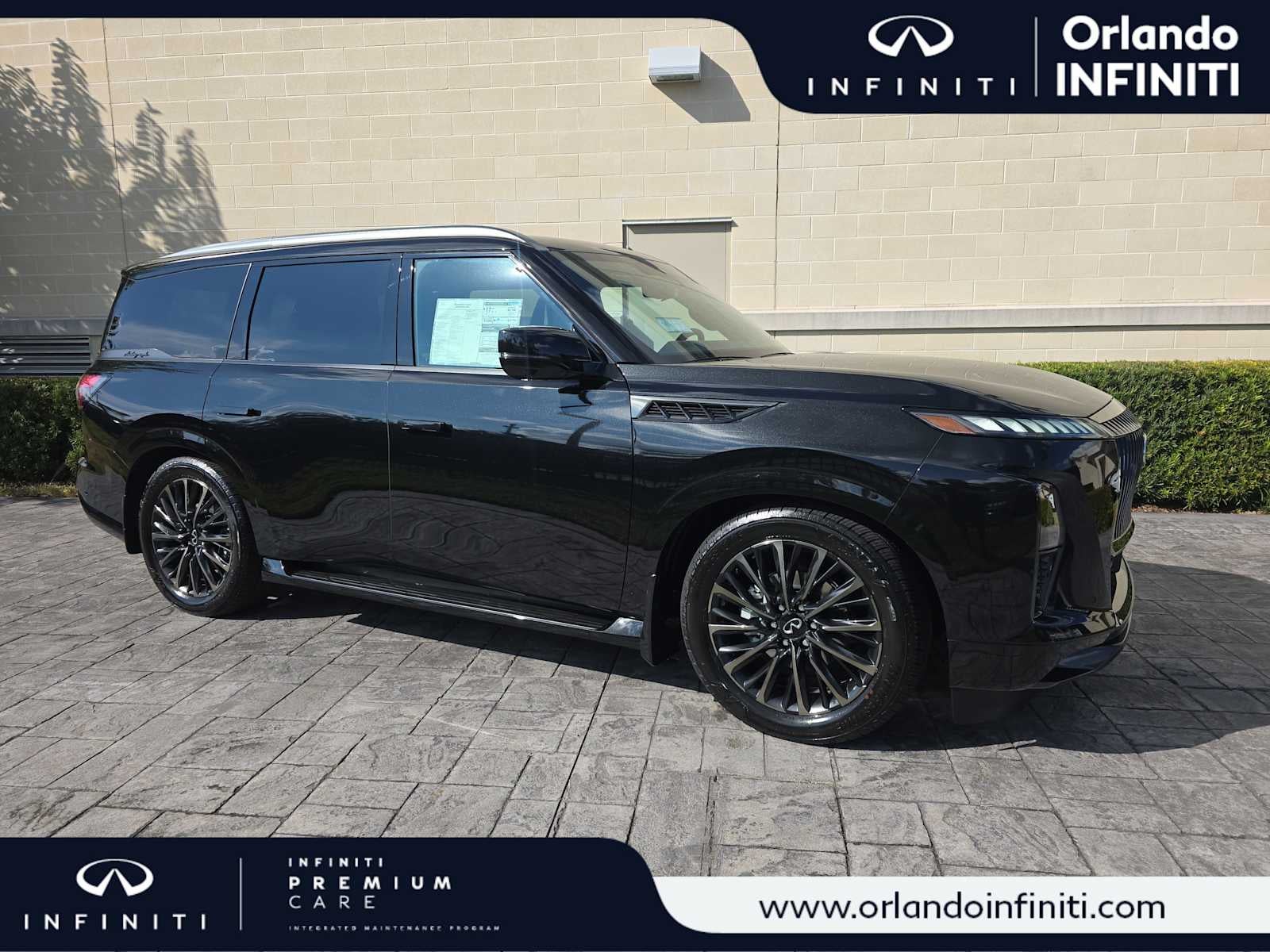 2026 INFINITI QX80 AUTOGRAPH in Mineral Black — front three-quarter view