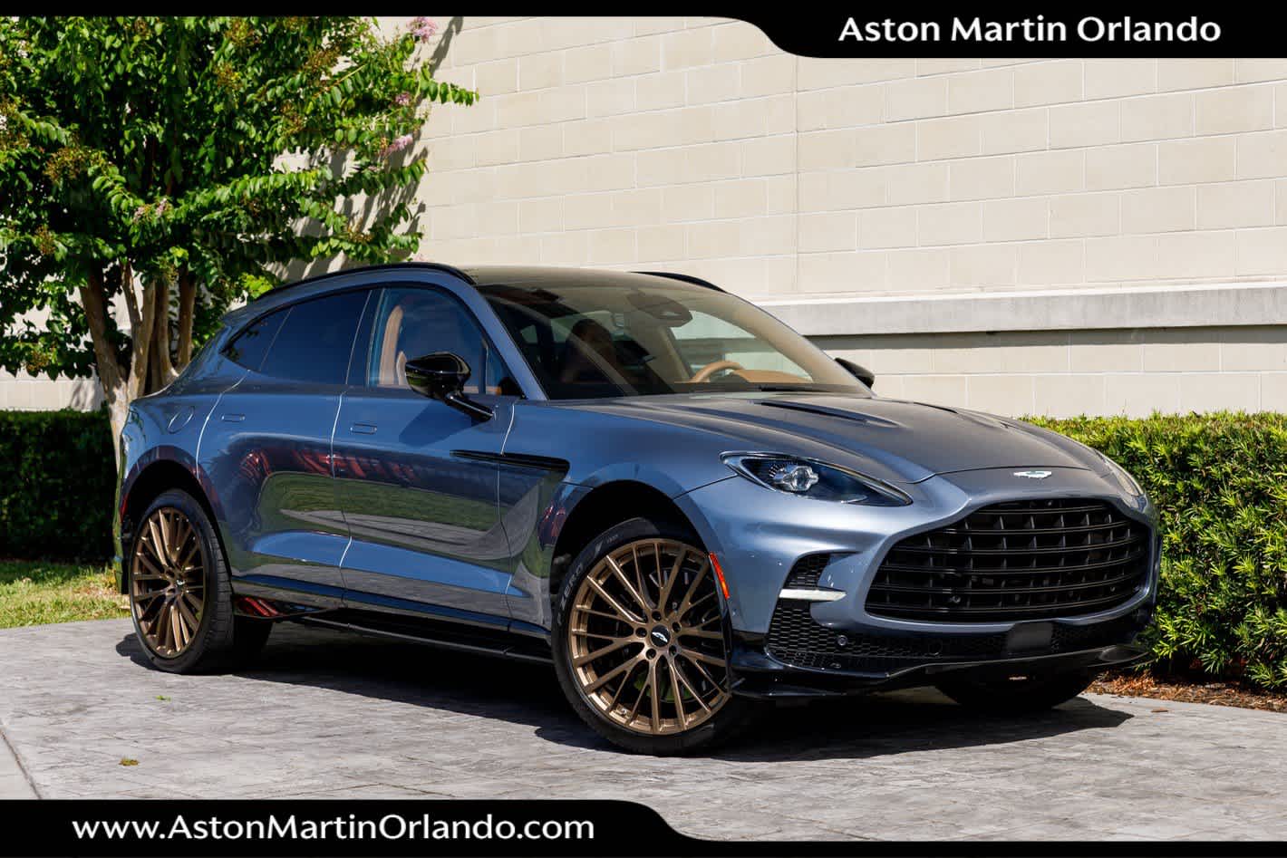 2025 Aston Martin DBX 707 in Concours Blue — front three-quarter view